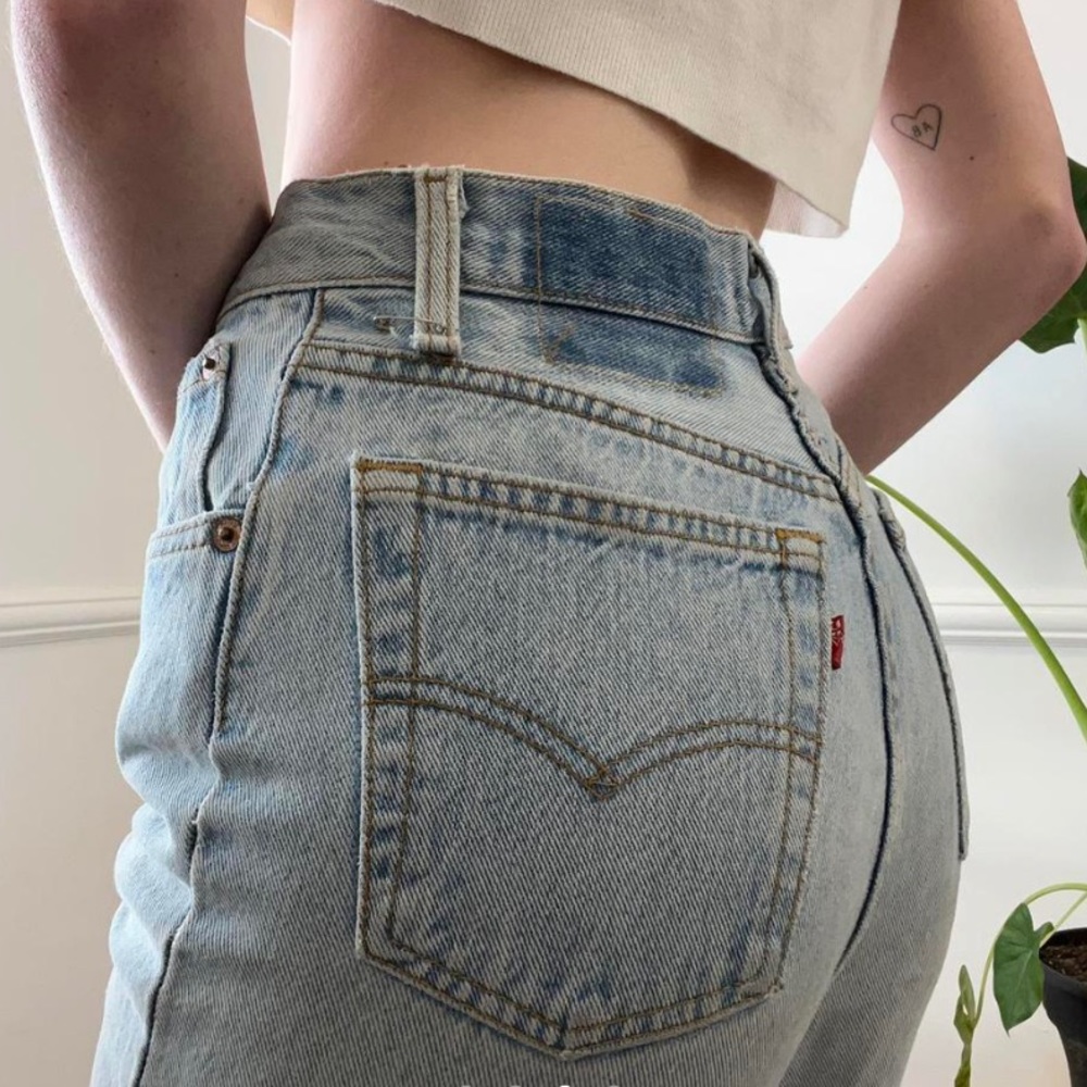 Lightwash classic Levi 501 style denim blue jeans